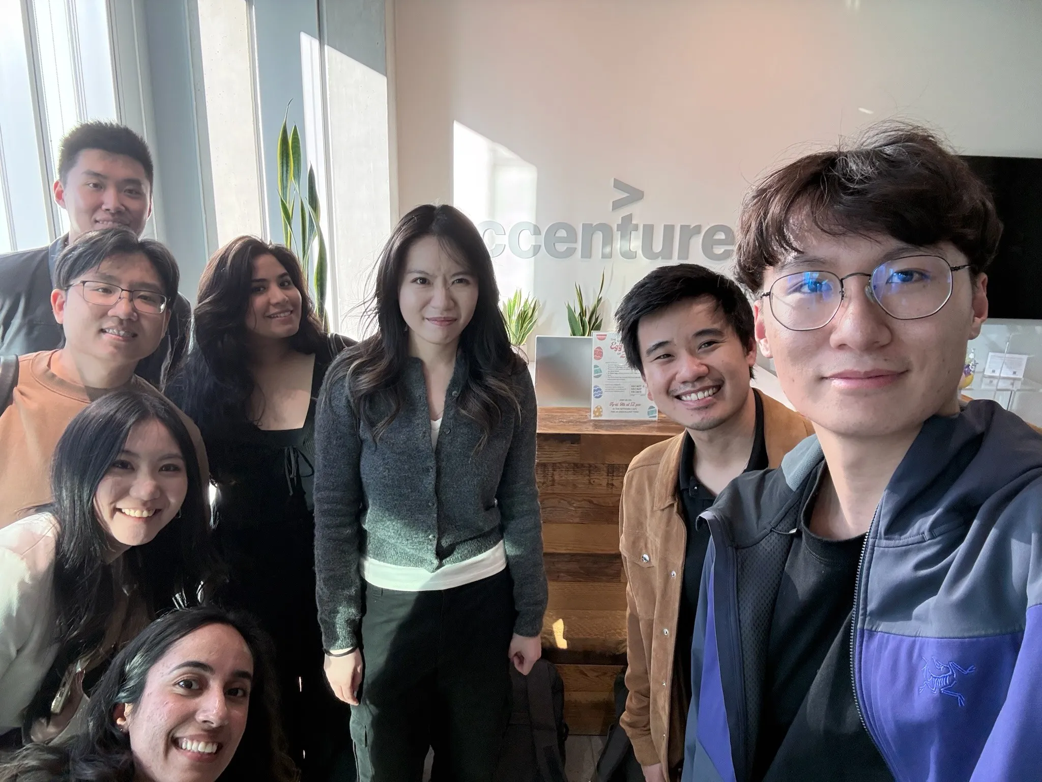 Selfie of the project team with the client at Accenture's office